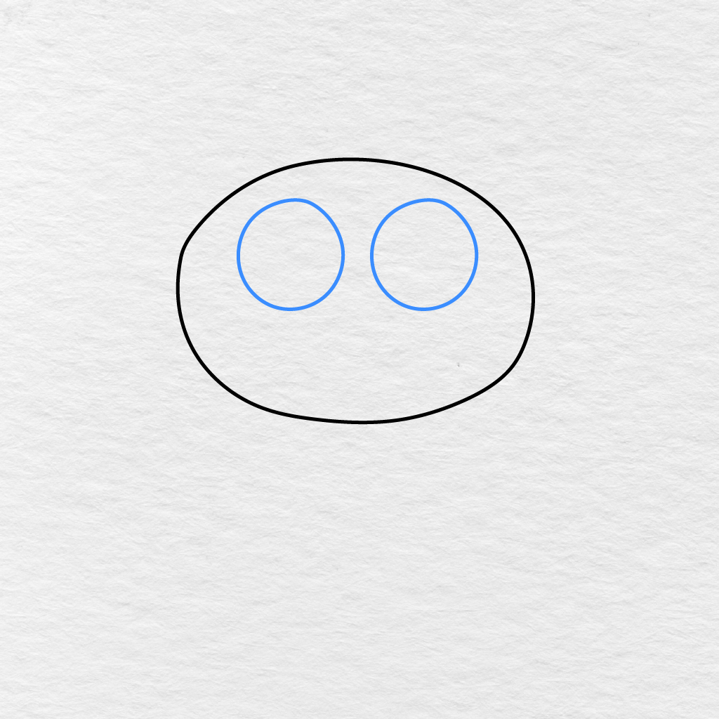 Step 2 Showing Two Large Round Eyes Added Inside The Cat’s Head.
