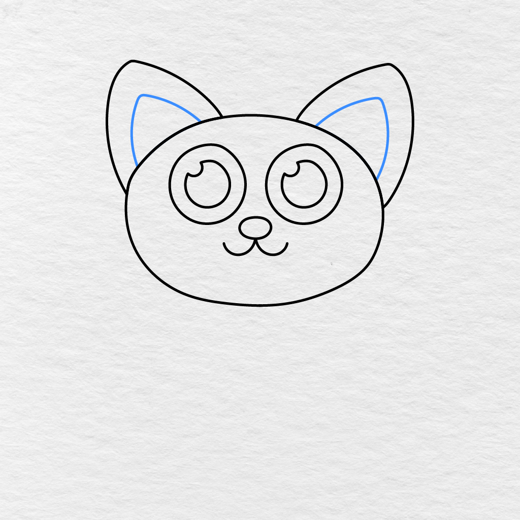 Step 6 Showing Smaller Pointed Shapes Added Inside The Cat’s Ears.