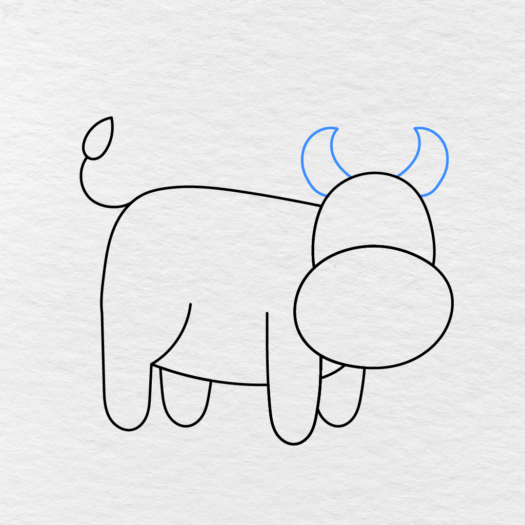 Step 7 Showing Two Curved Horns Added To The Top Of The Cow's Head.
