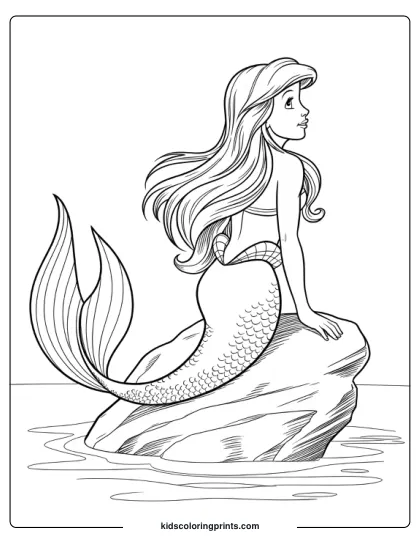 Andersen's Little Mermaid Sitting On A Rock With Her Tail Curling Gracefully Around Her In This Coloring Page.